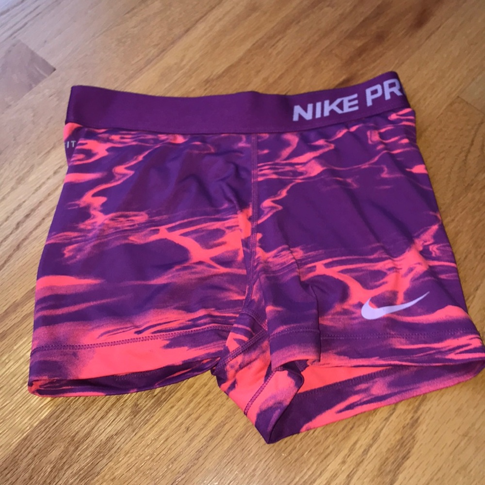 Pinkish and purple Nike pros excellent condition